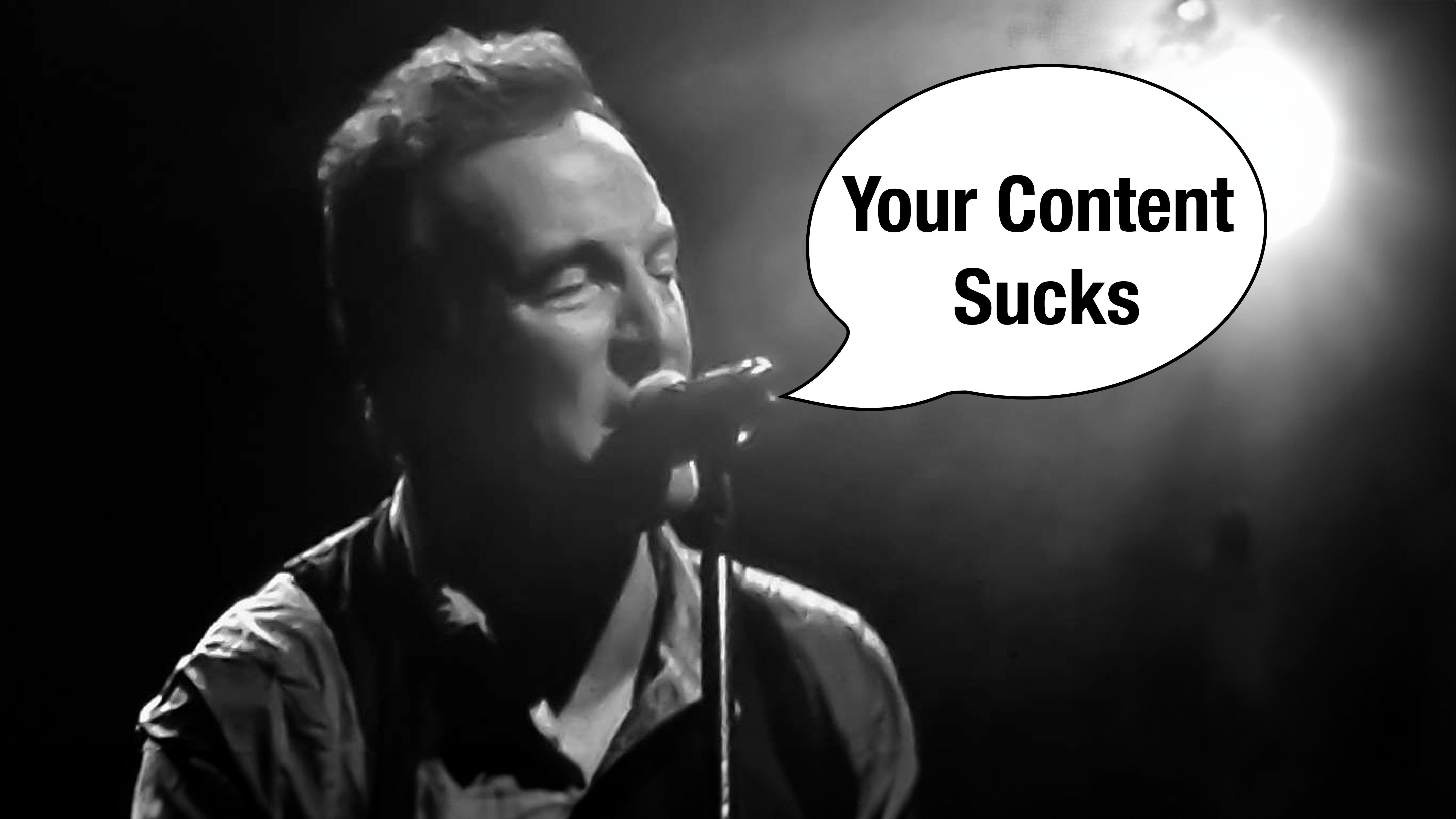 Bruce Springsteen singing into a microphone next to a speech bubble that says "your content marketing sucks"